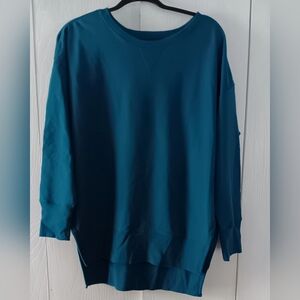 Women's Teal Sweatshirt Size 14W.. Short in front longer in the back.
